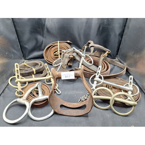 911 - Large Amount Of Horse Tack To Include Bits, Antique Stirrups and Leather Belts