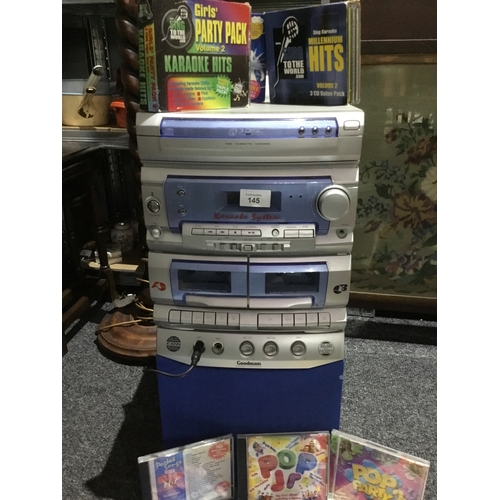 145 - Goodman’s Karaoke Machine With 16 DVDs Plus 3x Box Sets of Music