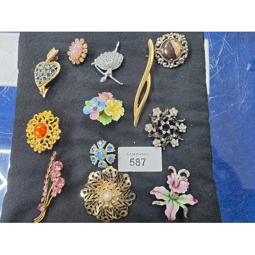 587 - Pad of Vintage and Fashion Brooches