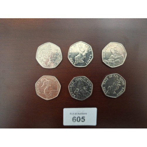 605 - Beatrix Potter Group of 50p Coins To Include Peter Rabbit x6