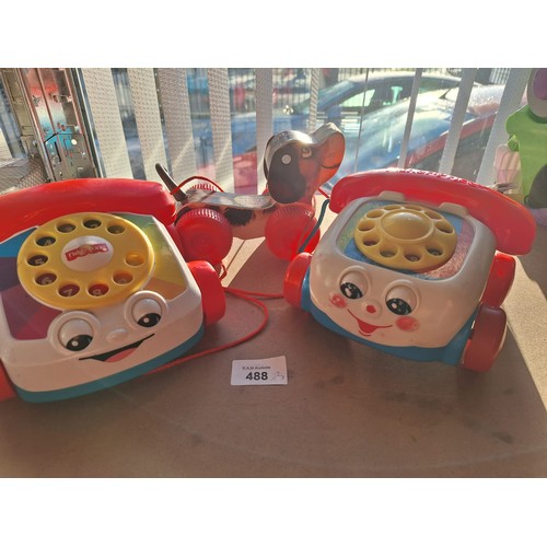 488 - Fisher Price Telephones x2 and a Fisher Price Little Snoopy