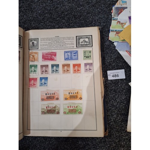 486 - Stamp Album and a Pack of Hundreds of Vintage Unchecked Stamps