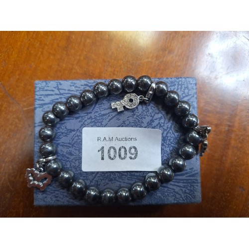 1009 - Hematite Bracelet With Charms