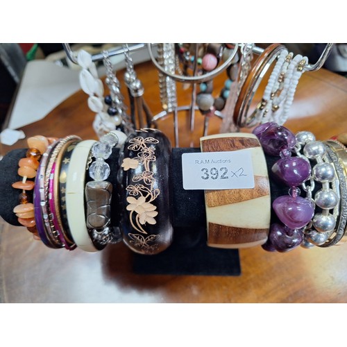 392 - Two Stands of Fashion and Vintage Bangles and Bracelets