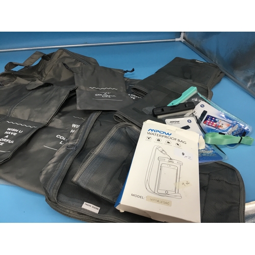 9 - Suitcase Storage Bags and a Waterproof Mobile Bag