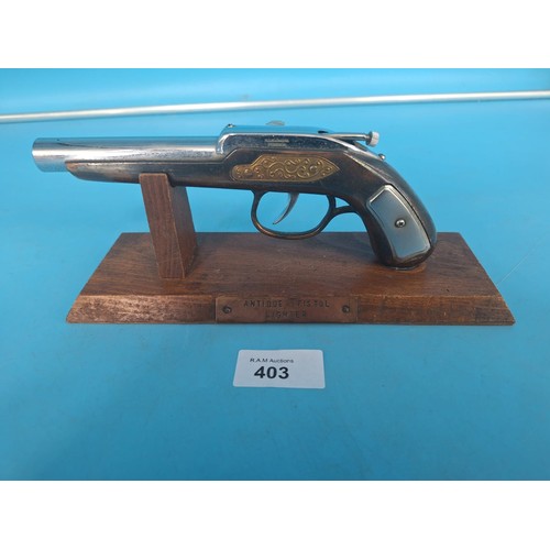 403 - Antique Pistol Lighter On a Plinth