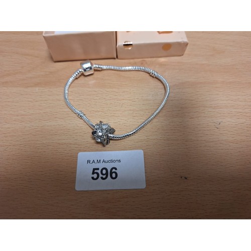 596 - Boxed 925 Silver Charm Bracelet and Glass Charm