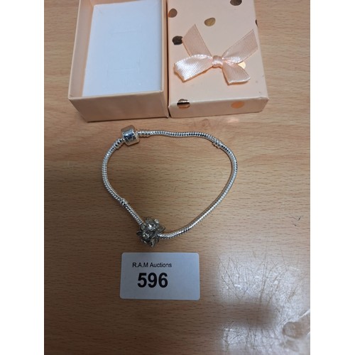 596 - Boxed 925 Silver Charm Bracelet and Glass Charm