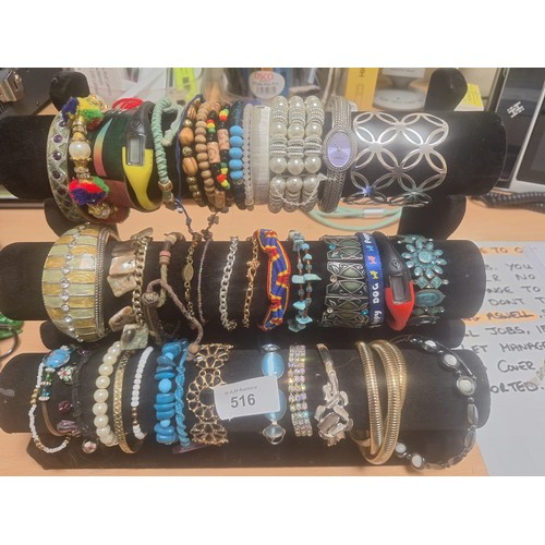 516 - Three Rolls of Fashion and Vintage Bangles, Watches and Bracelets