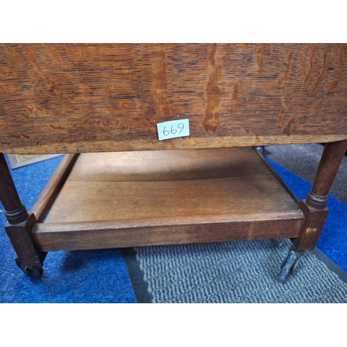 669 - Vintage/Antique Hostess Trolley With a Wheeled Bottom