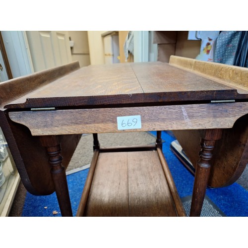 669 - Vintage/Antique Hostess Trolley With a Wheeled Bottom