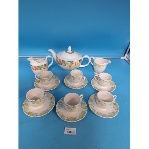 406 - Part Tea Set To Include 6 Cups, 6 Saucers, Teapot and 2 Milk Jugs