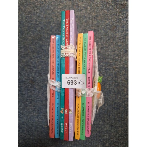 693 - Carrot Wrapped Beatrix Potter Books x9