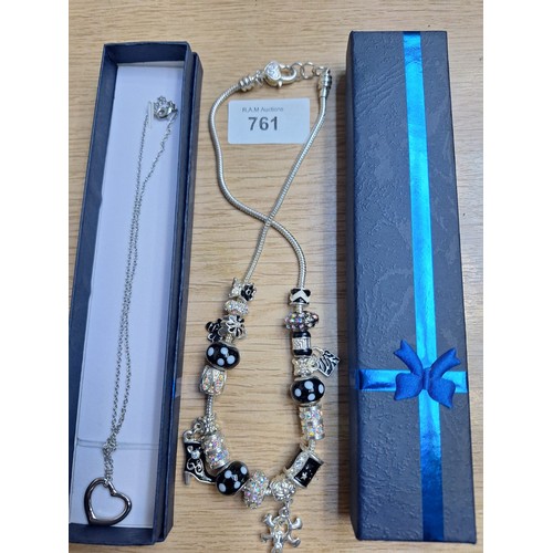 761 - Boxed Fashion Charm Necklace and a Boxed Silver Heart On a Chain