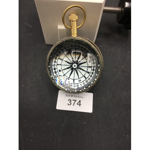 374 - Ships Clock and a Compass