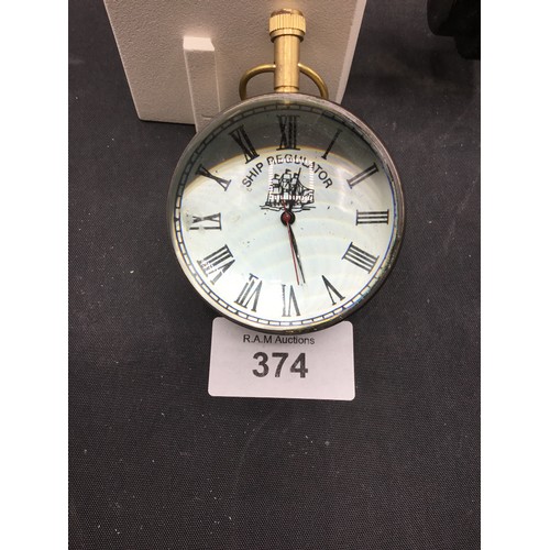 374 - Ships Clock and a Compass