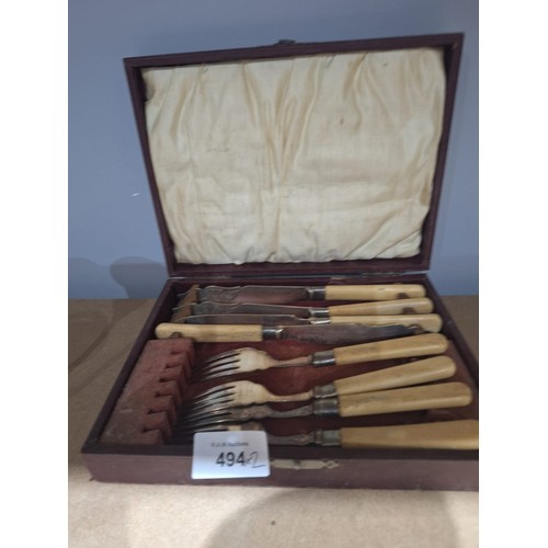 494 - Cased EPNS and Bone Knives and Forks and a 3 Branch Candelabra