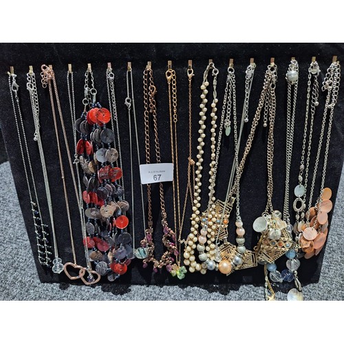 67 - Stand Of Fashion and Vintage Necklaces