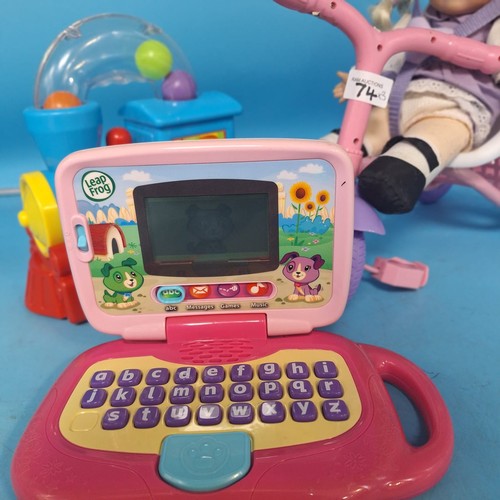 74 - Kiddies Toys x3 To Include Leap Frog Play and Learn, Push and Pull Train and a Baby Doll On a Scoote... 
