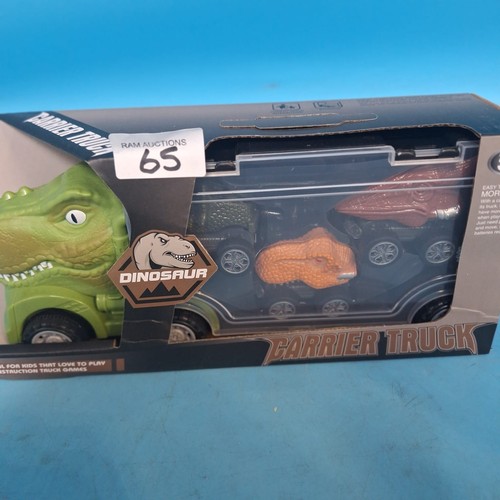 65 - New In The Box Dinosaur Carrier Truck With Dinosaur Cars Inside