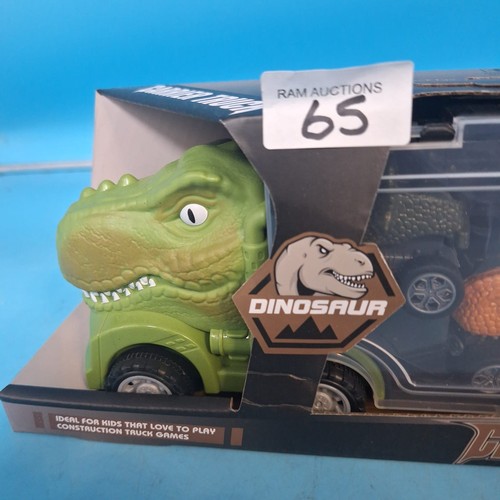 65 - New In The Box Dinosaur Carrier Truck With Dinosaur Cars Inside