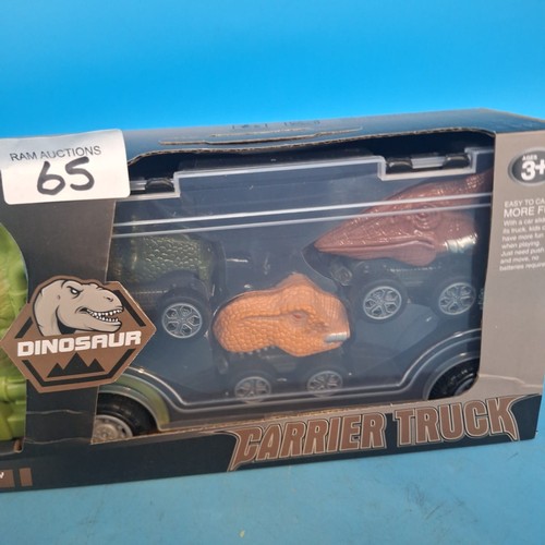 65 - New In The Box Dinosaur Carrier Truck With Dinosaur Cars Inside
