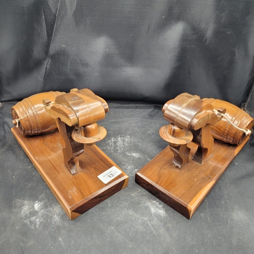 13 - A Pair of Mid-Century Stylized Ecuadorian Wood Folk Art Man Pulling Barrel Bookends