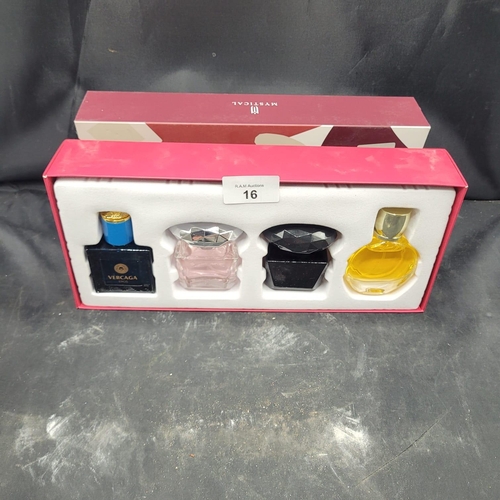 16 - A Contemporary Set of Four Fragrance Bottles, 'Mystical' Gift Set, with 'Vercaga' Bottle