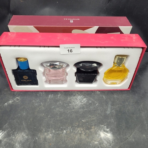16 - A Contemporary Set of Four Fragrance Bottles, 'Mystical' Gift Set, with 'Vercaga' Bottle