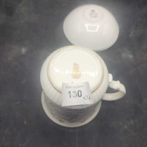 130 - A Group of Four Queen Anne Bone China Royal Commemorative Mugs and Saucers