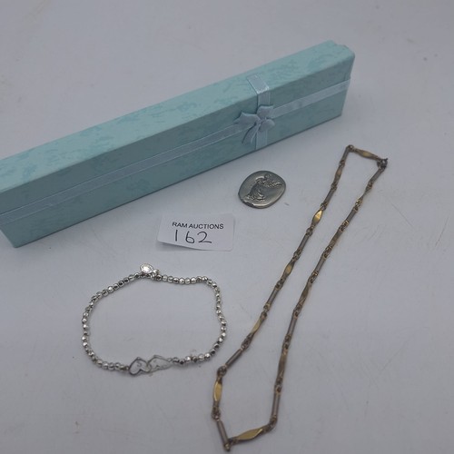 162 - BOXED VINTAGE NECKLACE, BRACELET AND PEACE TOKEN