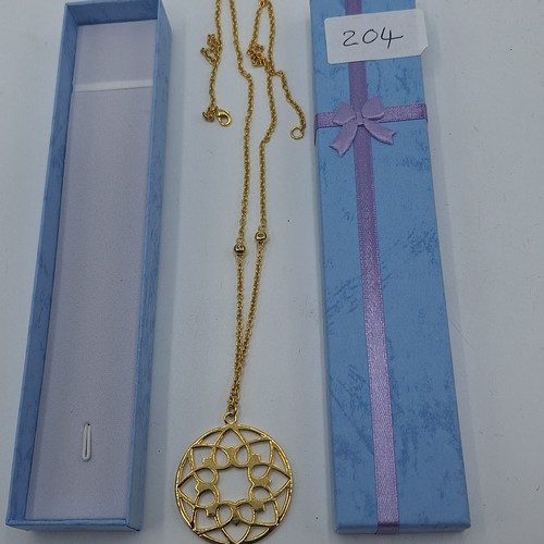 204 - Gold Tone Metal Necklace With a Round Heart Pendant