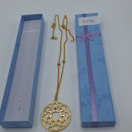 204 - Gold Tone Metal Necklace With a Round Heart Pendant