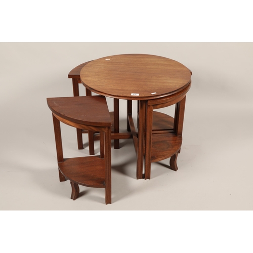 Mid 20th century stained teak / hardwood nest of tables; with four