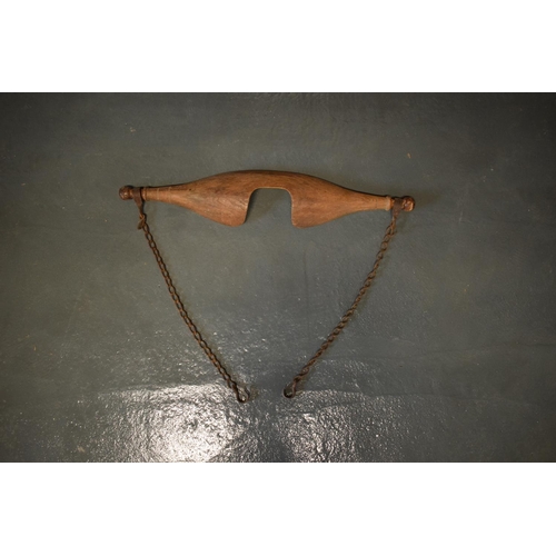 103 - 19th century wooden farmer's yoke with chains