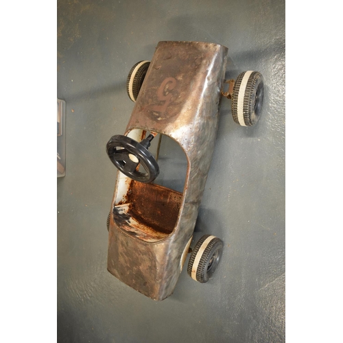 104 - 1950s metal Childs pedal car (stripped back to metalwork)