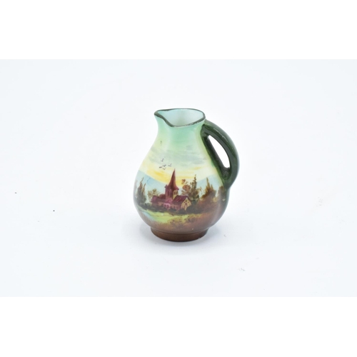 106 - Royal Doulton miniatures series ware jug of a rural scene