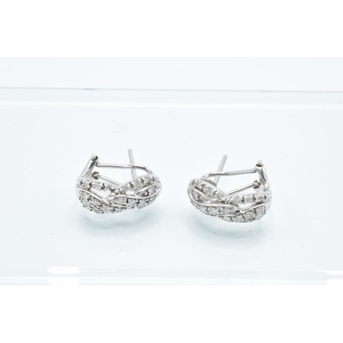 202 - 9ct white gold earrings with diamonds: 3.9 grams total weight