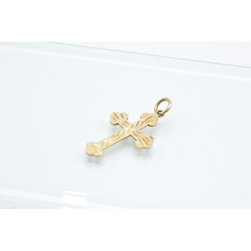 203 - Small 9ct gold crucifix : 0.6 grams