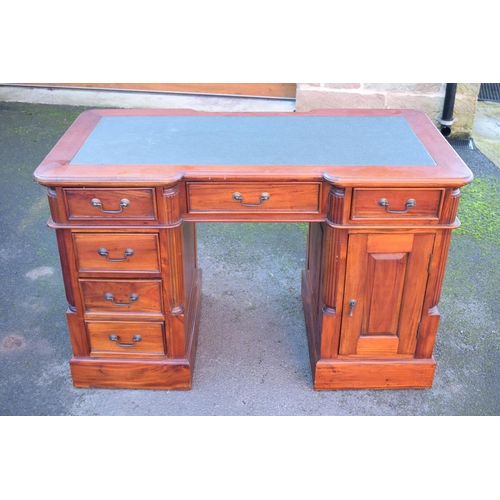 288 - 20th century knee hole desk with draws and a cupboard with a leather inset