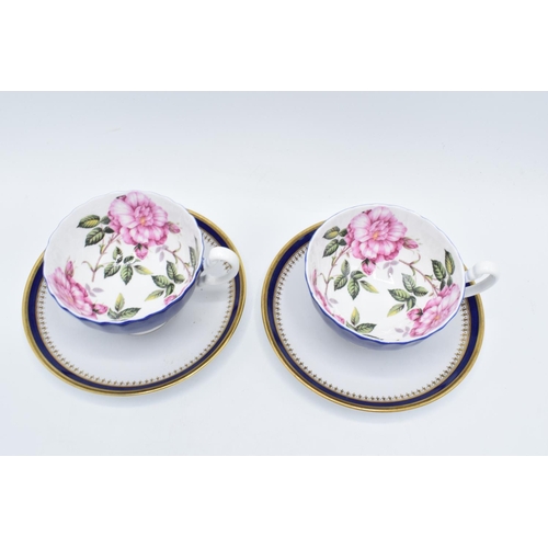 329 - Aynsley blue floral cups together with Spode Knightsbridge design saucers (4 pieces)