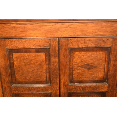 355 - Large Georgian oak corner cabinet with bottom drawer