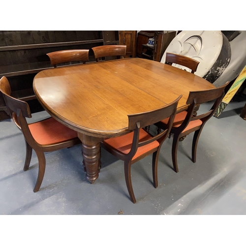 377 - Grand Victorian extending dining table complete with 6 matching chairs and 4 leaves