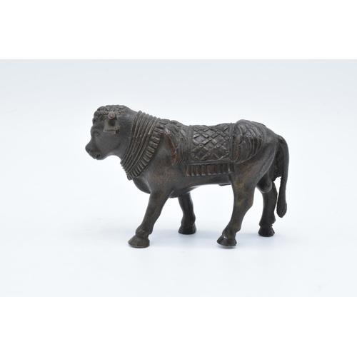 105 - Antique Oriental heavy bronze figure of a bull. In good condition with no obvious damage or restorat... 