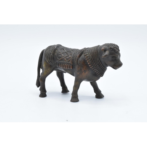 105 - Antique Oriental heavy bronze figure of a bull. In good condition with no obvious damage or restorat... 