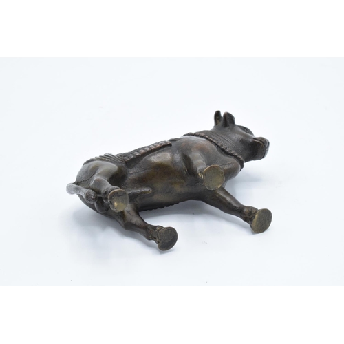 105 - Antique Oriental heavy bronze figure of a bull. In good condition with no obvious damage or restorat... 