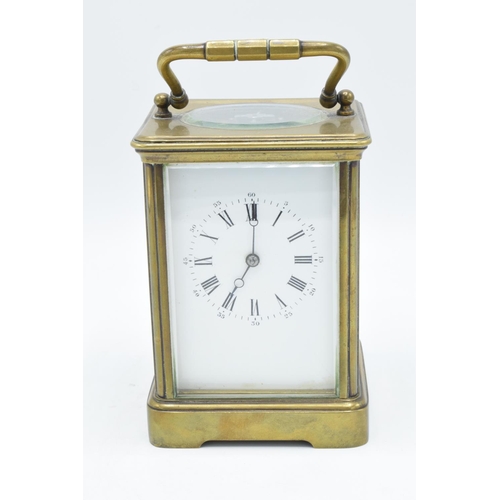 110 - 19th century brass carriage clock with two-train striking movement. When wound up, it doesn't tick, ... 