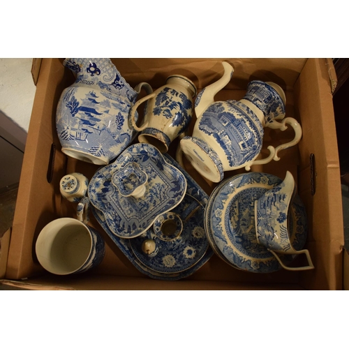 160 - A collection of English 19th century blue and white pottery to include teapots, jugs etc (all damage... 