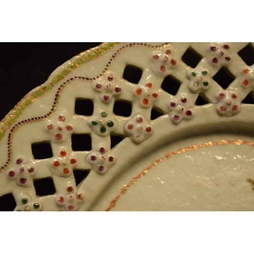194 - Chinese export pierced porcelain painted with a family crest to consist of a desert basket with stan... 