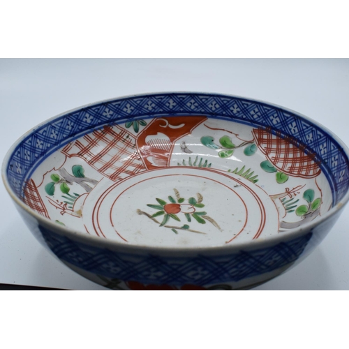 195 - Antique Japanese thick porcelain bowl. In good condition with some firing blemishes and scratches et... 
